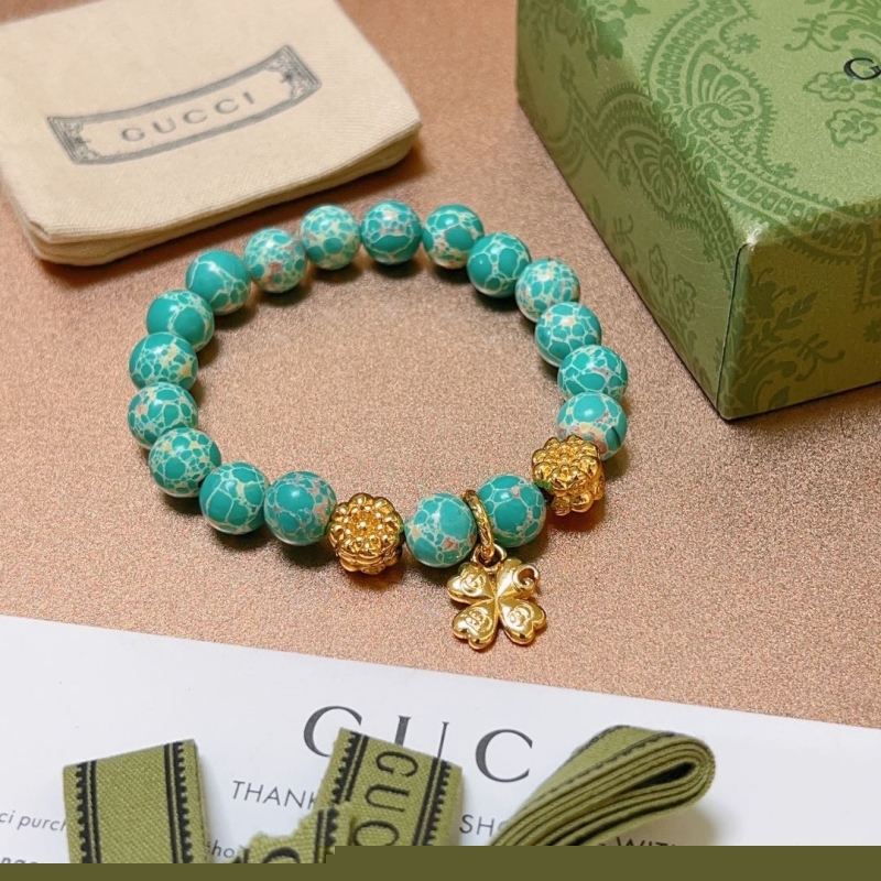 G*u*i bracelets